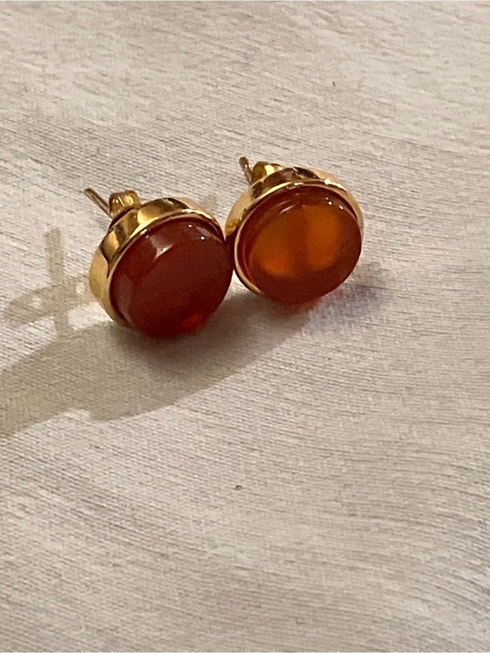 Cornelian studs on gold earrings in velvet bag cabochan in bezel setting pierce